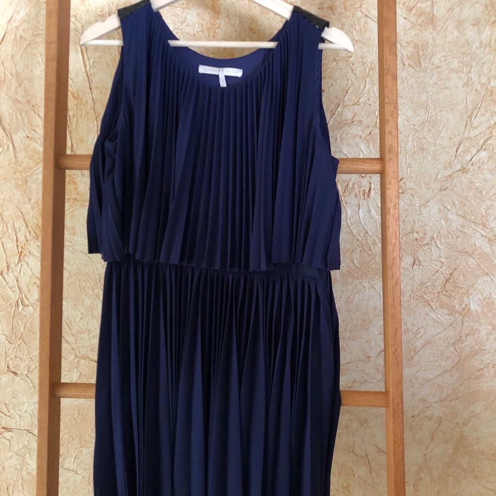 Deep purple sleeveless pleated dress